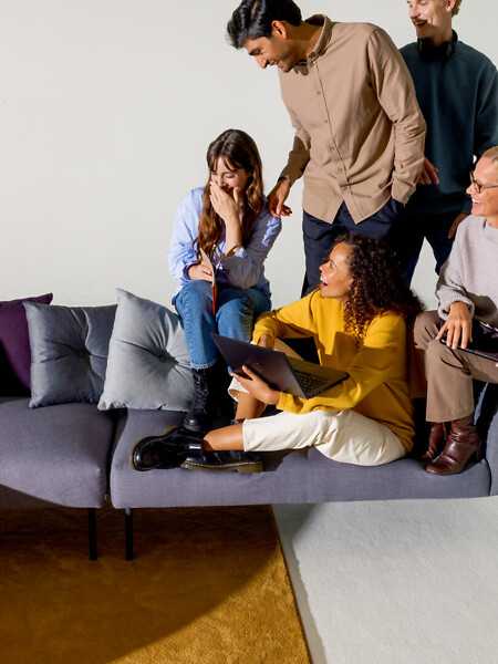 A family on a Martela sofa
