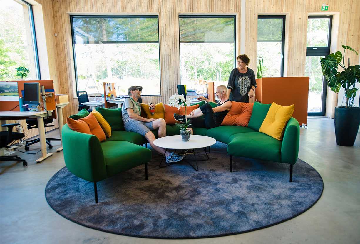 Teachers at Drøbak Montessori School sitting on Martela's Nooa sofa