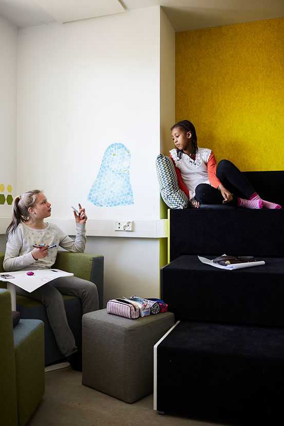 Pupils at English School in Helsinki sitting on Martela's Beatbox and Bit stools