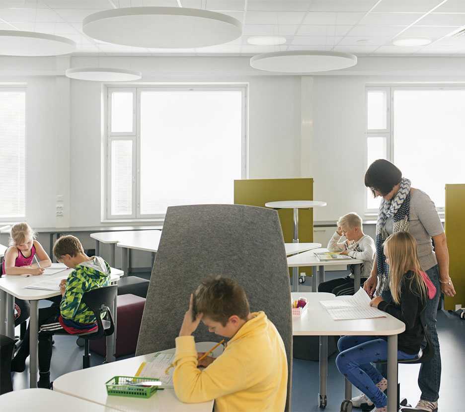 Pupil studying behind Martela's TiiPii at Juteinikeskus in Hattula, Finland