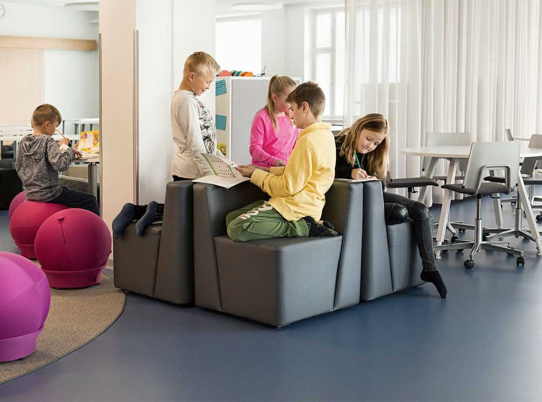 Pupils studying on Martela's Bit chairs at Juteinikeskus in Hattula, Finland