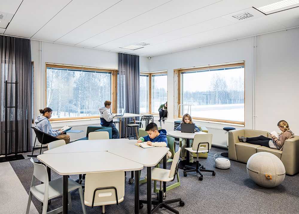 Pupils studying in a classroom