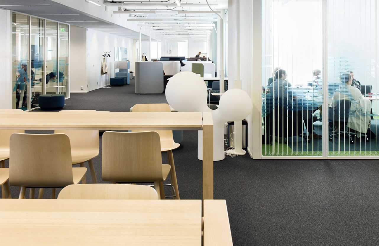Martela's wooden Sola chairs at Solteq's office in Vantaa, Finland