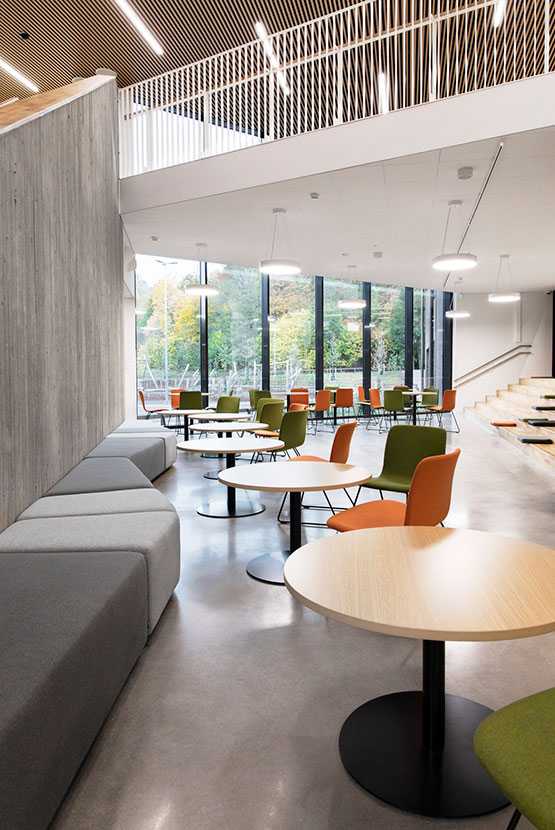 Martela's Diagonal Play benches, Sola chairs and Spot tables at Syvälahti Community Centre in Turku, Finland