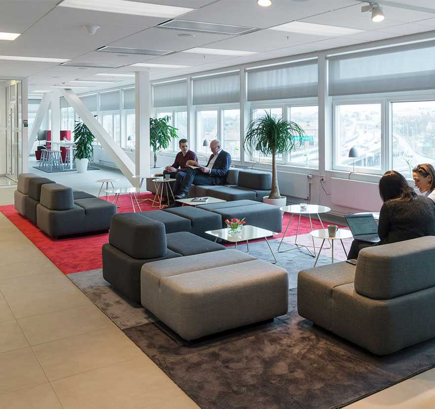 Martela's Movie sofas and Scoop tables at Vitec's office in Stockholm, Sweden
