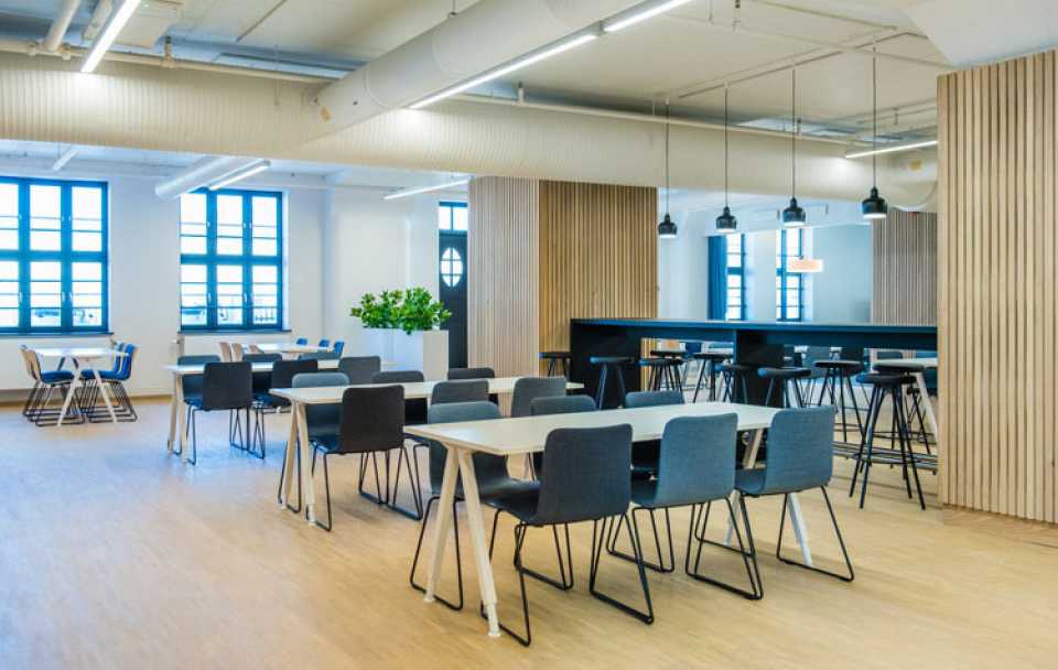 Martela's Sola chairs and Alku tables in Havnelageret's canteen in Oslo