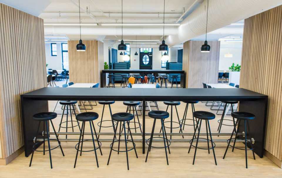 Martela's Chat tables and Drop stools at Havnelageret's canteen in Oslo