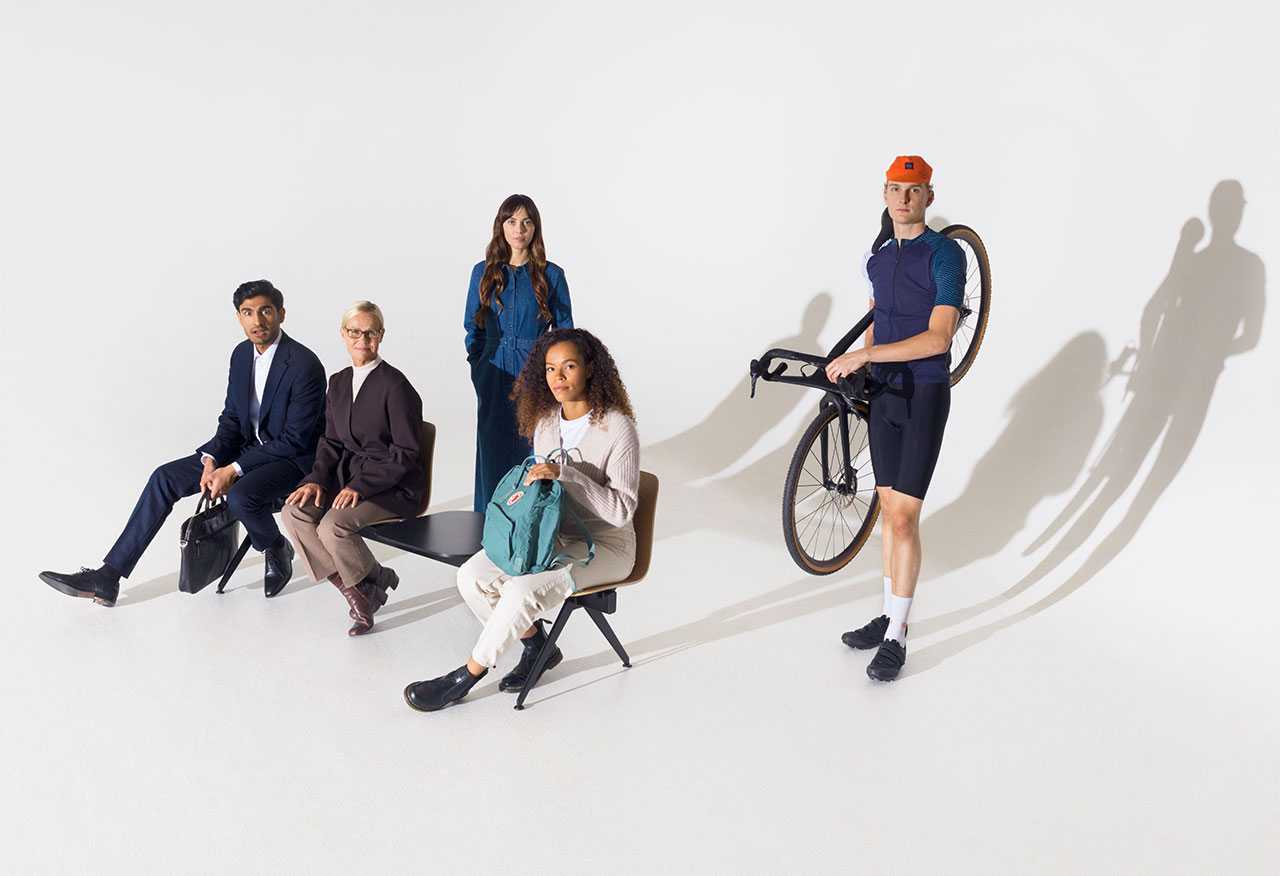 People sitting on a Sola Beam bench