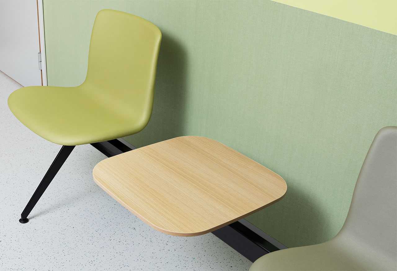 Close-up of a Sola beam chair in a hospital corridor
