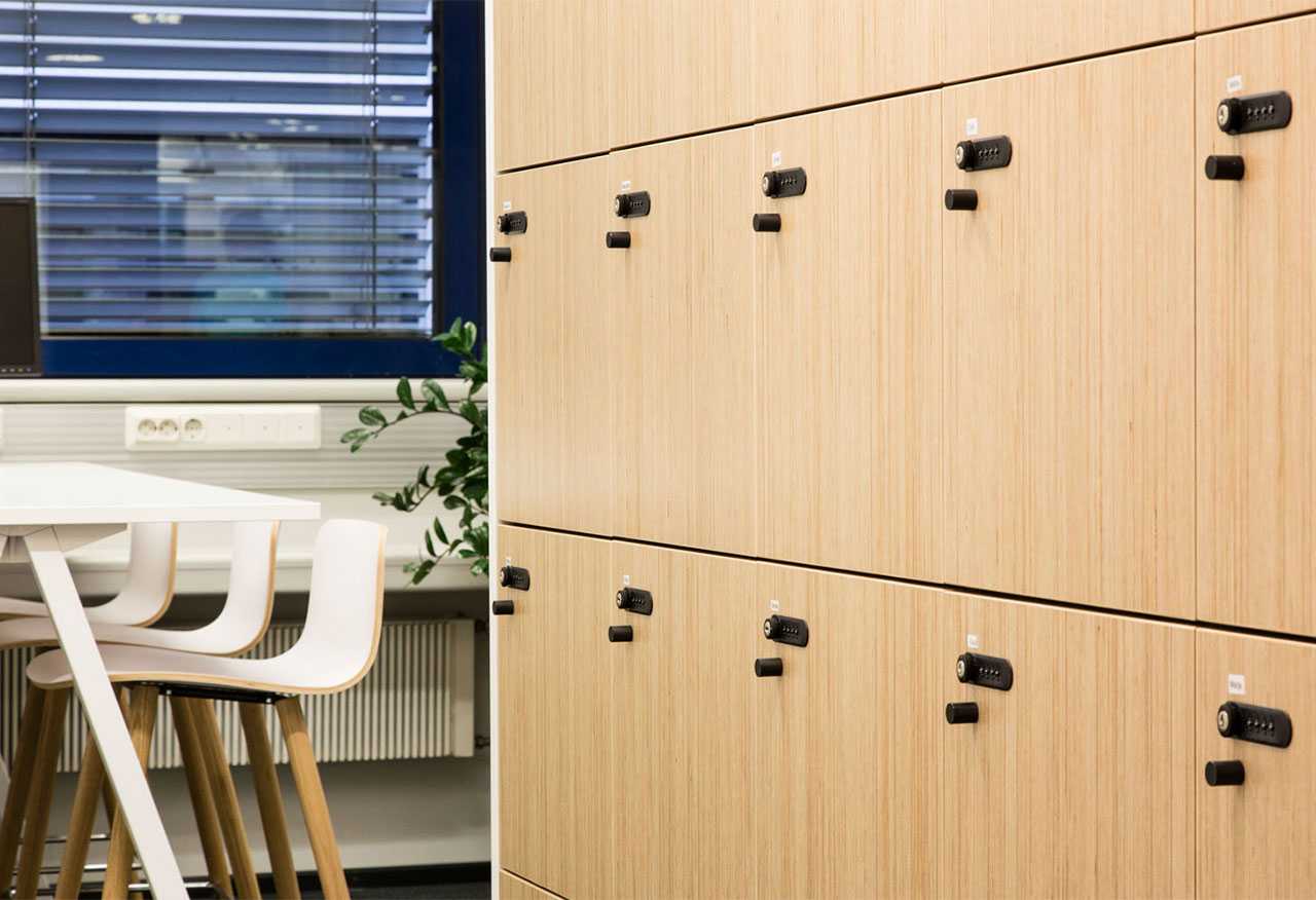 Martela's The Wall locker cabinet, Sola chairs and Frankie table at the Finnish Red Cross Blood Service's premises in Helsinki