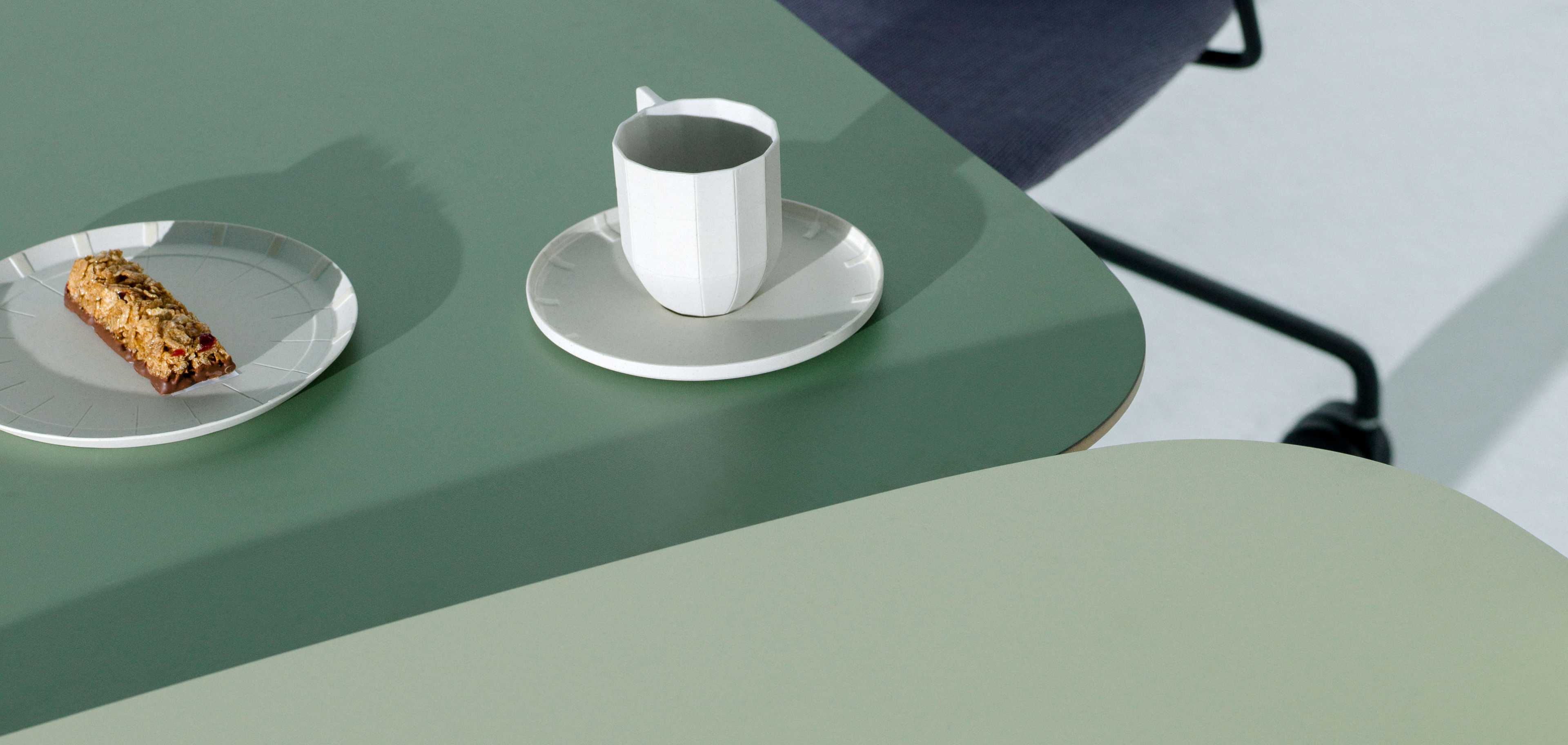 Green desks with coffee