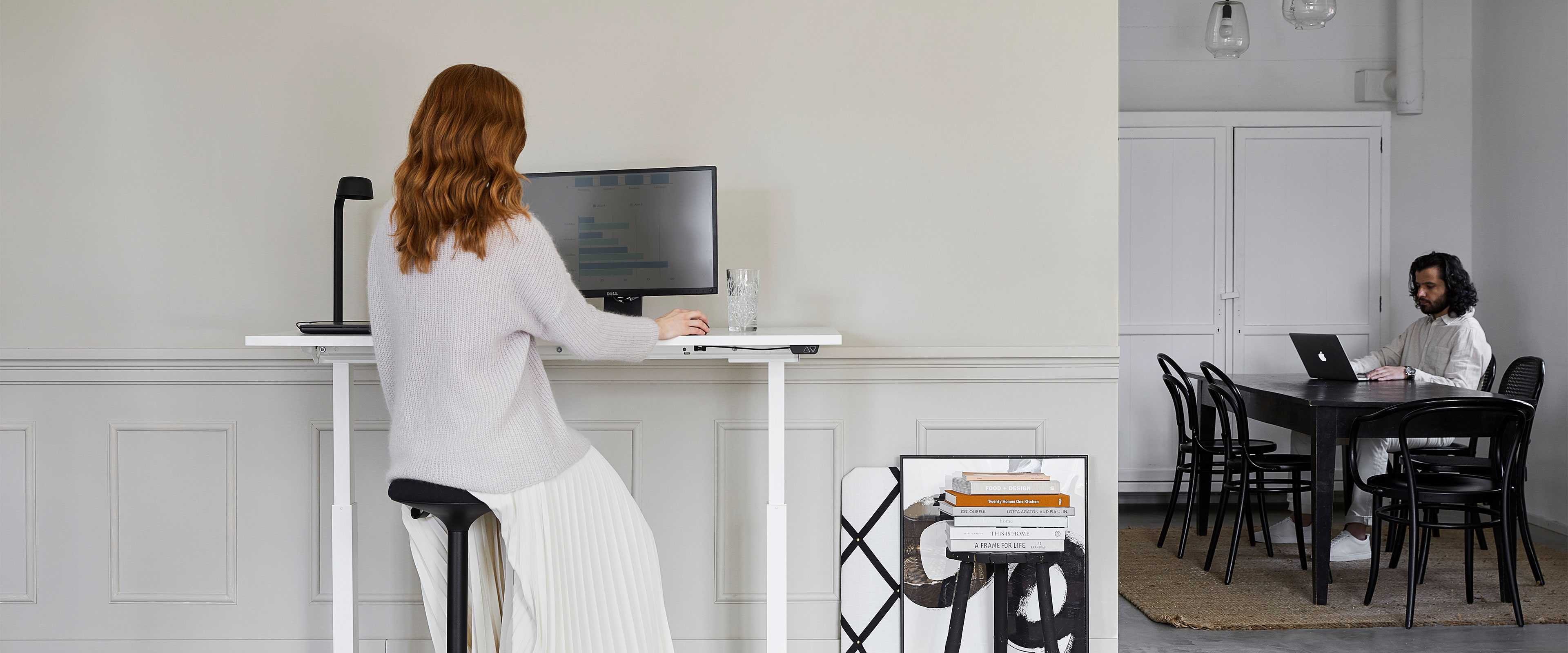 Woman and man working in a home office