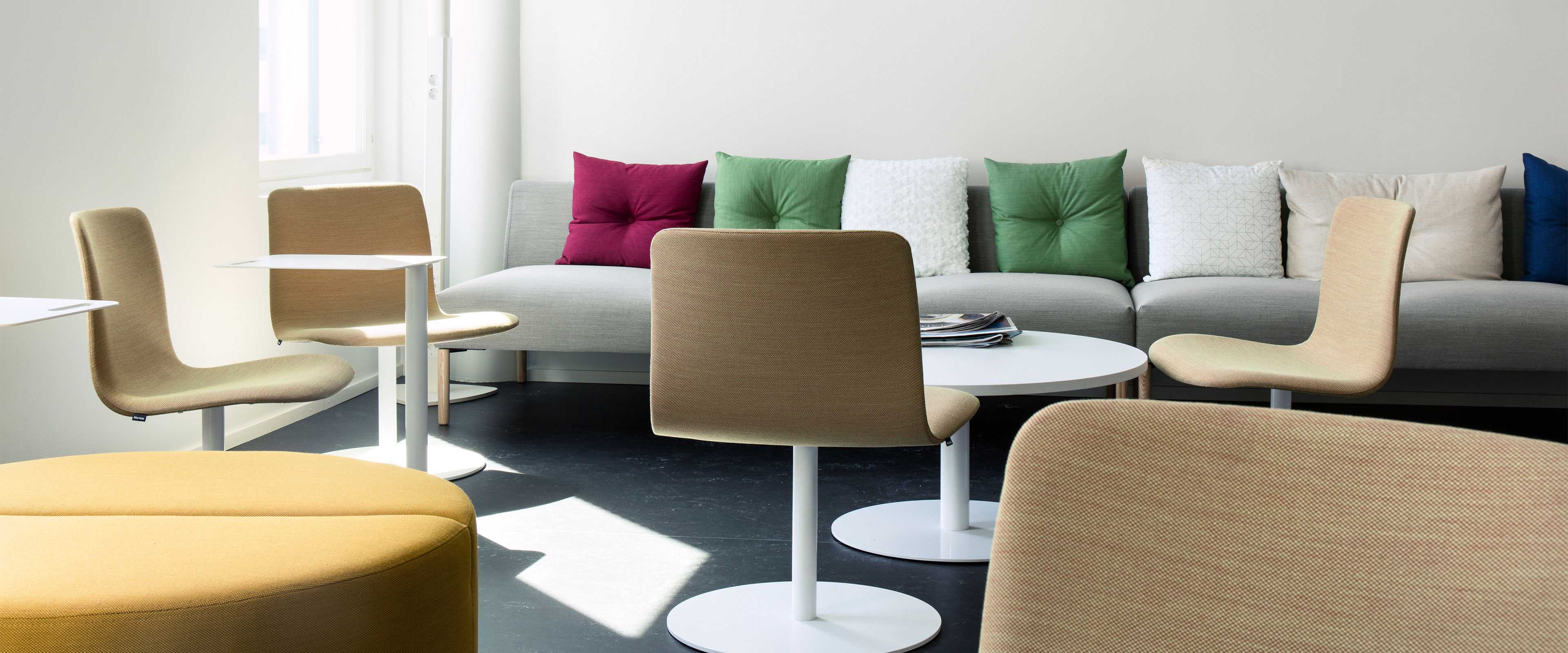 Martela's Sola chairs and Nooa sofa at Solteq's office in Vantaa, Finland