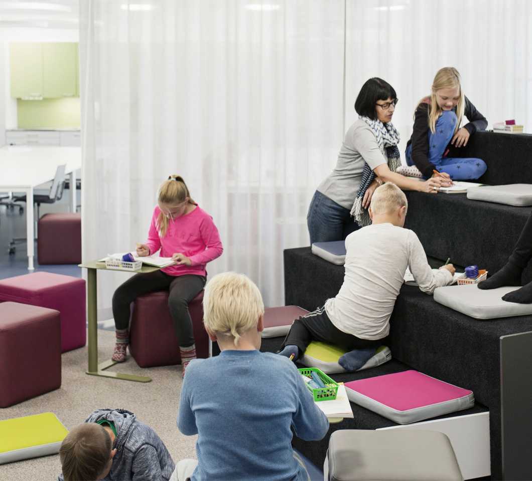 Pupils studying at Martela's Beatbox, Bit stools and Trailer tables at Juteinikeskus School in Hattula, Finland