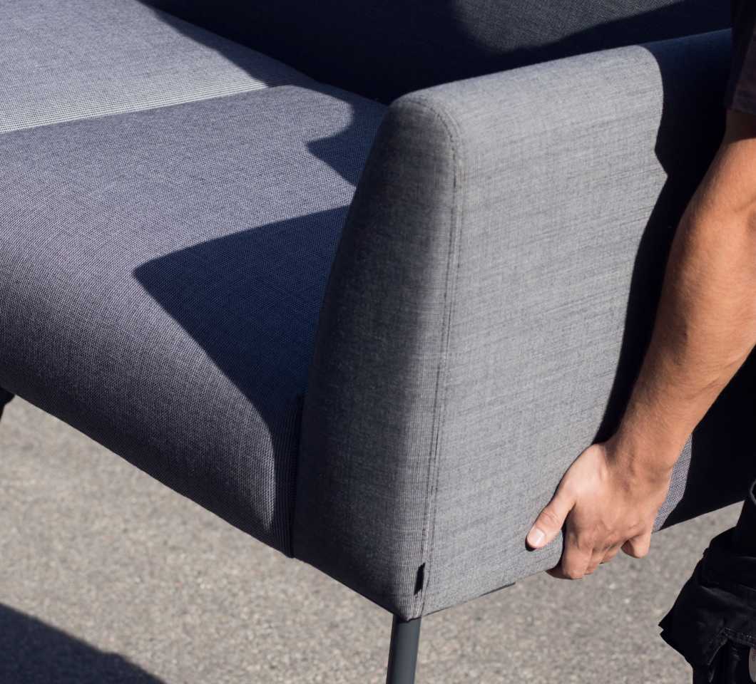 Movers delivering Martela's Nooa sofa